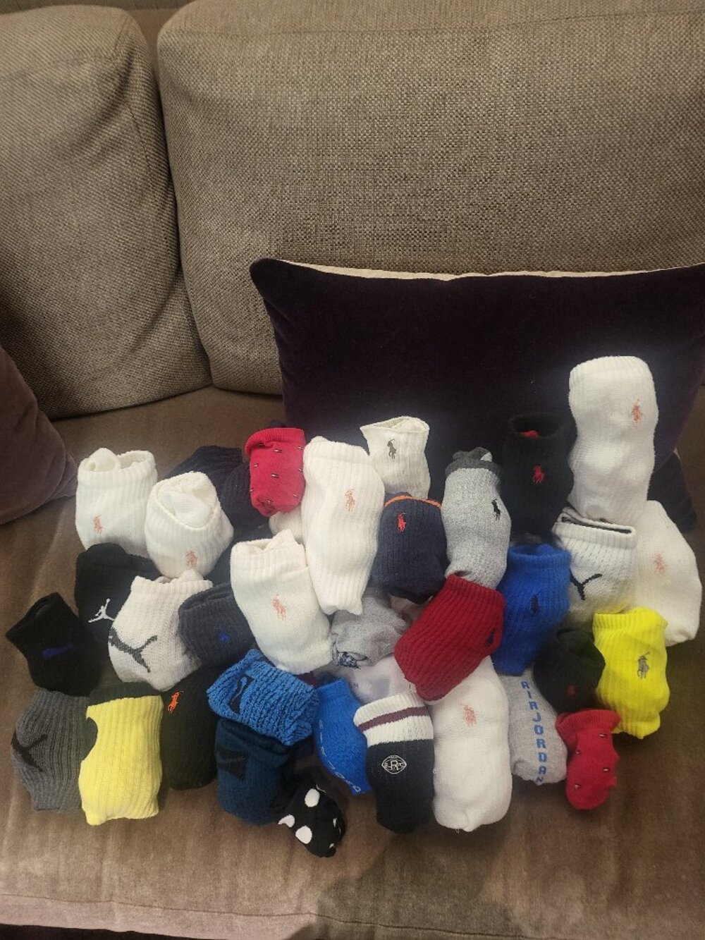 42 pairs of socks in a variety of sizes